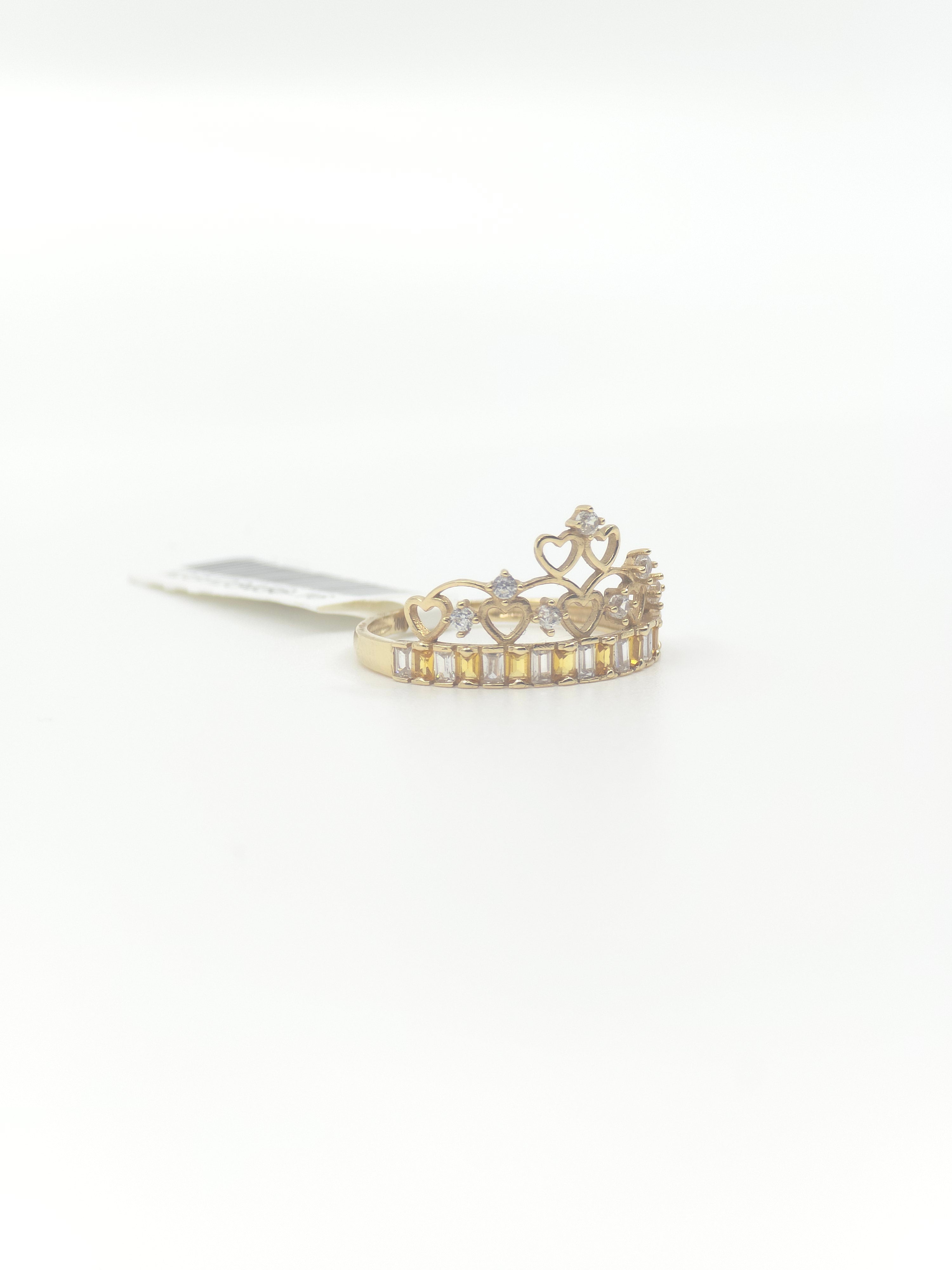 10kt Gold Crown with yellow and white stone.